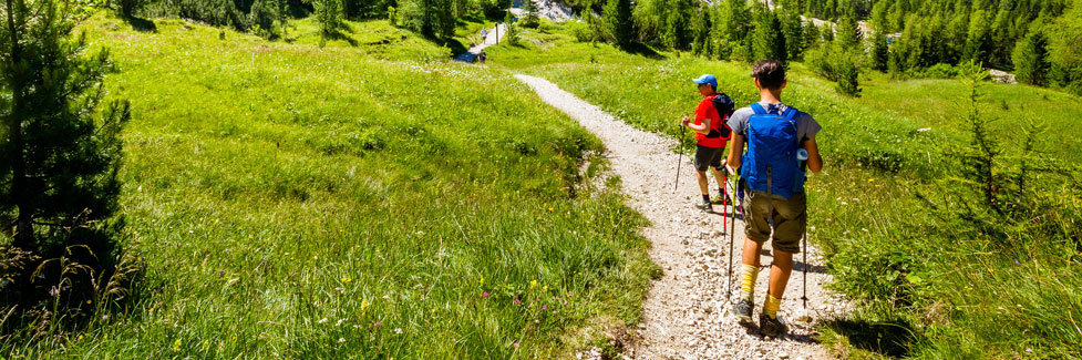 backpackers on mountain trail